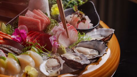 a sashimi platter arrayed with seafood