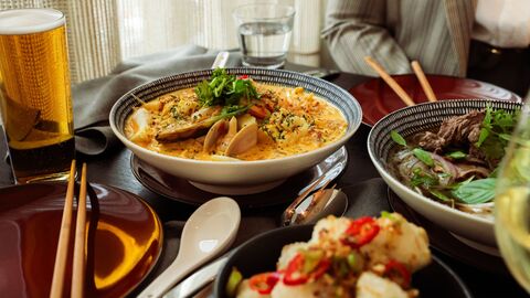 bowls of laksa and pho at fat noodle