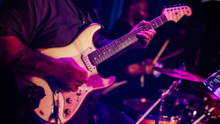 a man playing a guitar