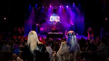 people looking at a stage
